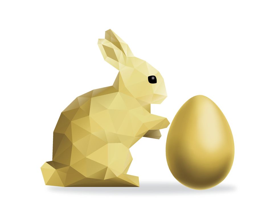 Low Poly Gold Rabbit with Gold Easter Egg over White