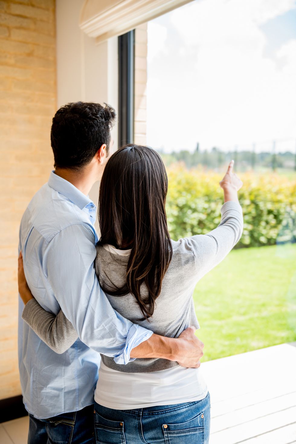 Couple looking through the window