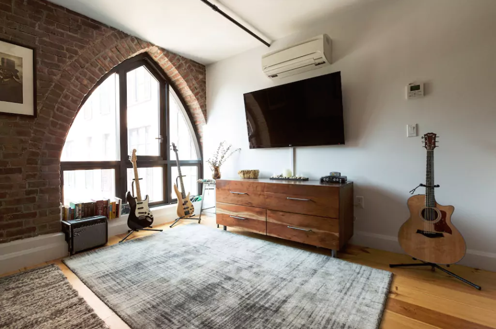 <p>If you need a good city fix, check out this <a href="https://www.airbnb.com/rooms/12912510" target="_blank">Brooklyn apartment</a> inside a converted church building. The space is adorned with tasteful contemporary decor, plus an extensive guitar collection for the musically-inclined. This one-bedroom loft starts at £260 per night. </p>
