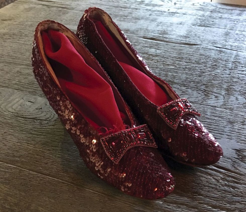 <p>This pair of replica ruby slippers from <em data-redactor-tag="em" data-verified="redactor">The Wizard of Oz</em>&nbsp;is a part of a memorabilia collection owned by Reynolds.</p>