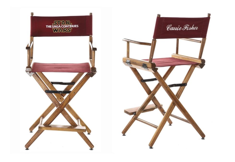 <p>Fisher's on-set chair with personalised chair back is embroidered with <em data-redactor-tag="em" data-verified="redactor">Star Wars: Episode VI - Return of the Jedi</em>.</p>