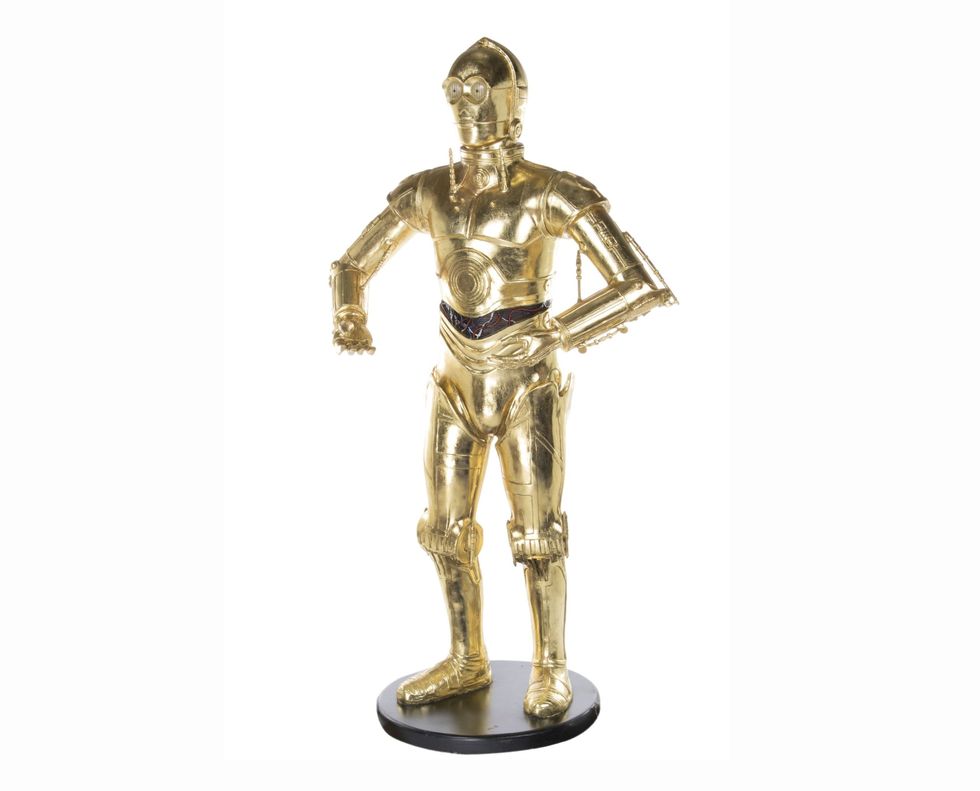 <p>This life size model of C-3PO from the <em data-redactor-tag="em" data-verified="redactor">Star War</em><em data-redactor-tag="em" data-verified="redactor">s </em>franchise belonged to Fisher. </p>