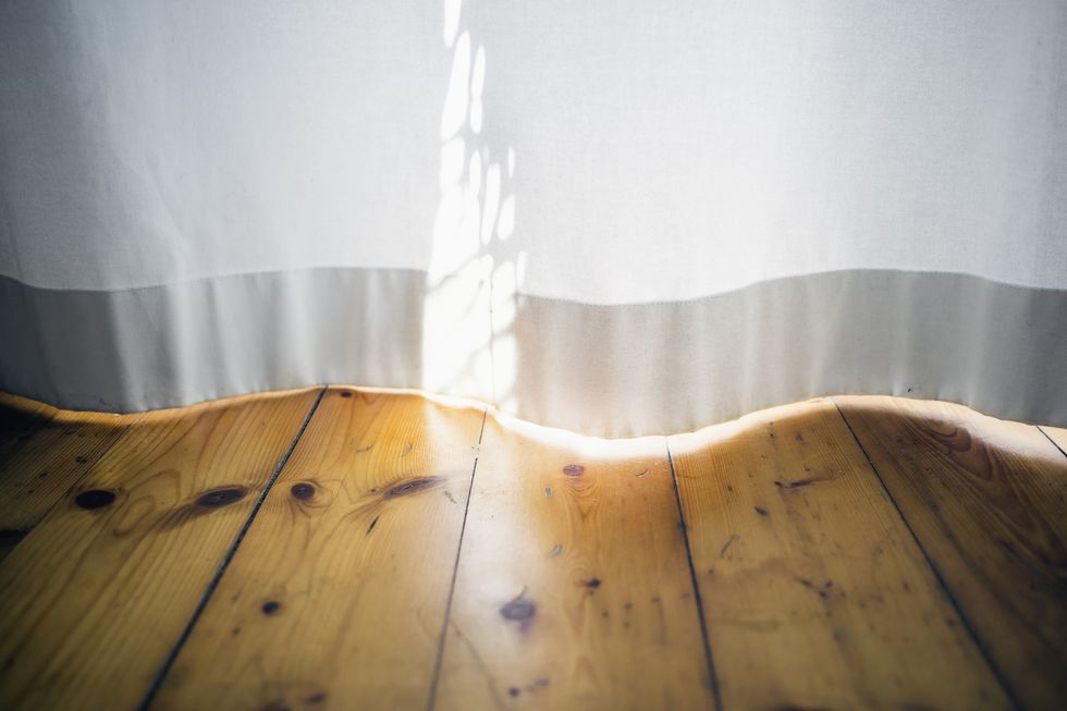 Morning sunlight on a white curtain