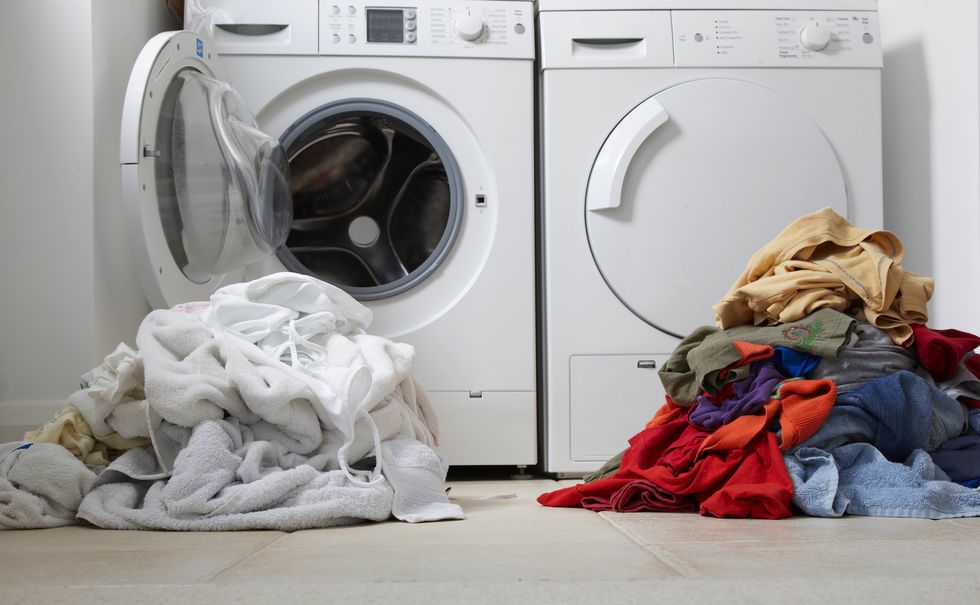 Pile of washing and washing machine and tumble dryer