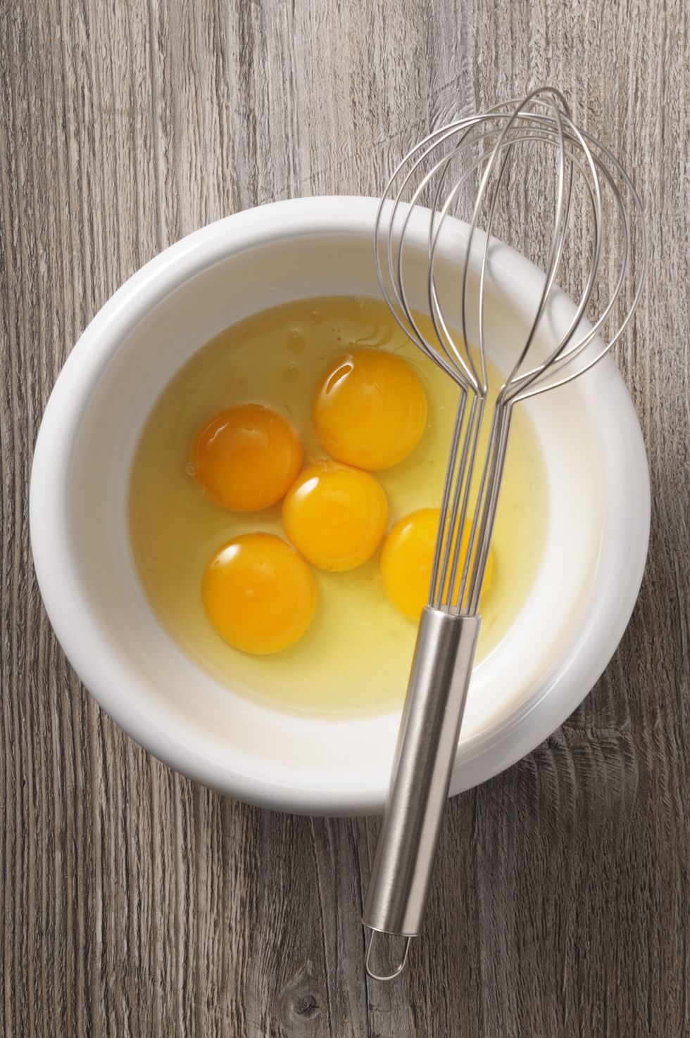 Like wine and herbs before it, egg yolks and whites go great in ice cube trays, too. You will have to thaw the cubes completely if using them to bake, but the whites can be defrosted right in the pan for omelets!