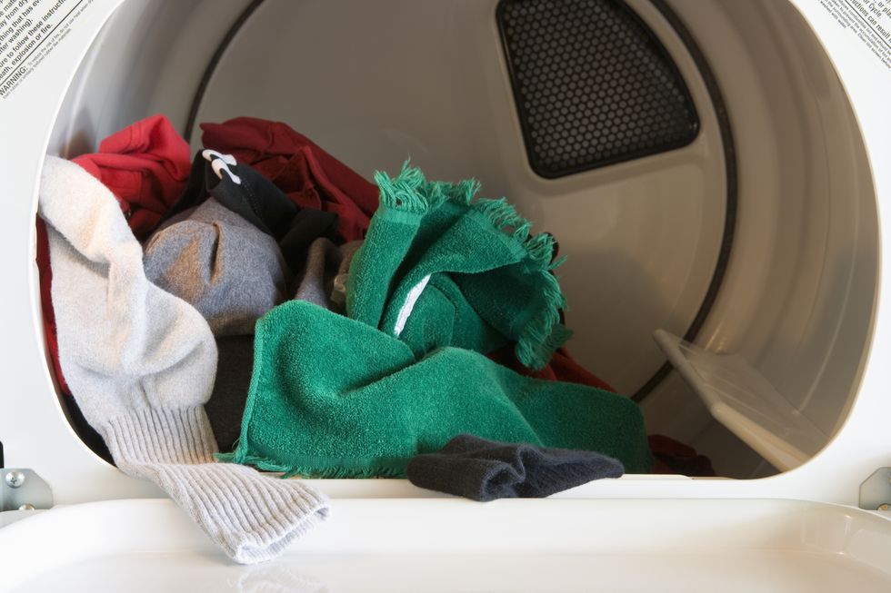 Clothes inside a tumble dryer machine