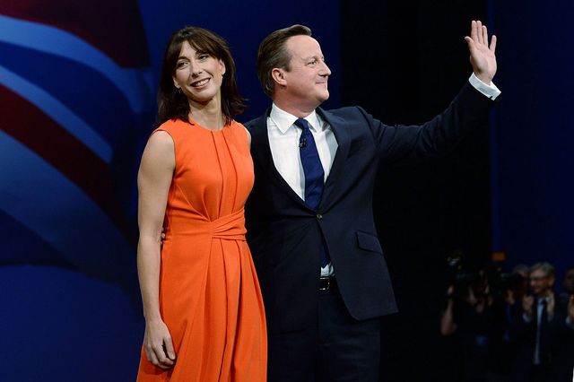 Prime Minister David Cameron poses with wife Samantha