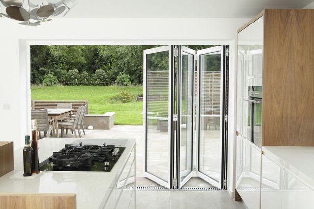 Kitchen with open patio doors