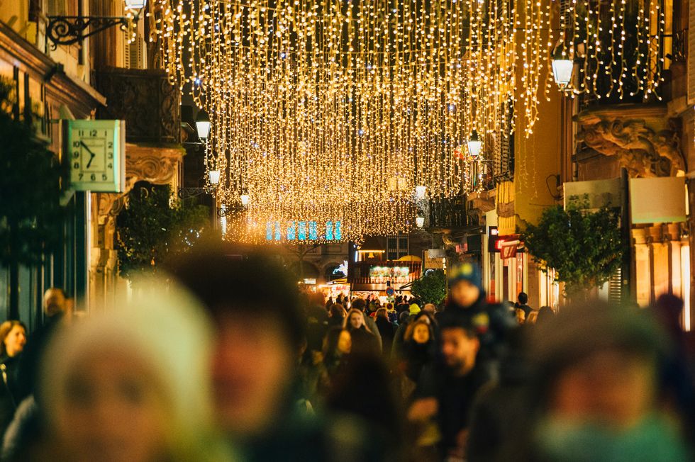 Christmas in France Crowd on busy shopping Christmas street