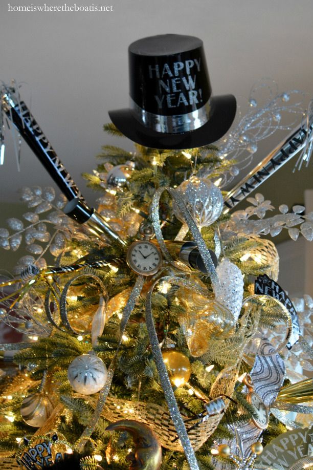 <p>Tiny timepieces, a party hat tree topper, and shimmering gold and silver ribbon will let your guests know where the party's at.</p><p><em data-redactor-tag="em"><a href="https://homeiswheretheboatis.net/2015/12/30/new-years-celebration-with-a-countdown-table-and-tree/" target="_blank" data-tracking-id="recirc-text-link" data-href="https://homeiswheretheboatis.net/2015/12/30/new-years-celebration-with-a-countdown-table-and-tree/">Get the tutorial from Home Is Where the Boat Is »</a></em></p>