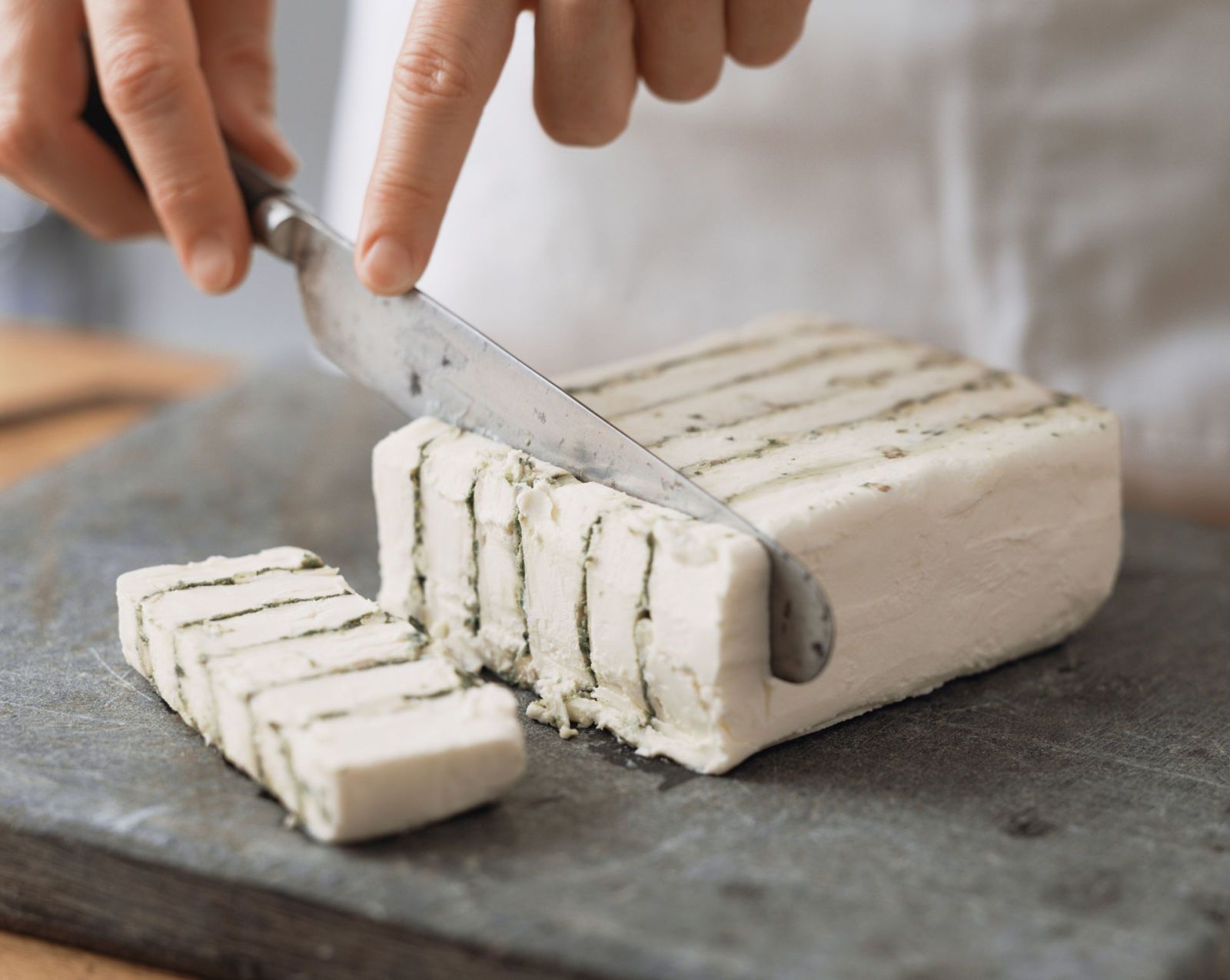 How We Should Actually Be Cutting Different Types Of Cheese