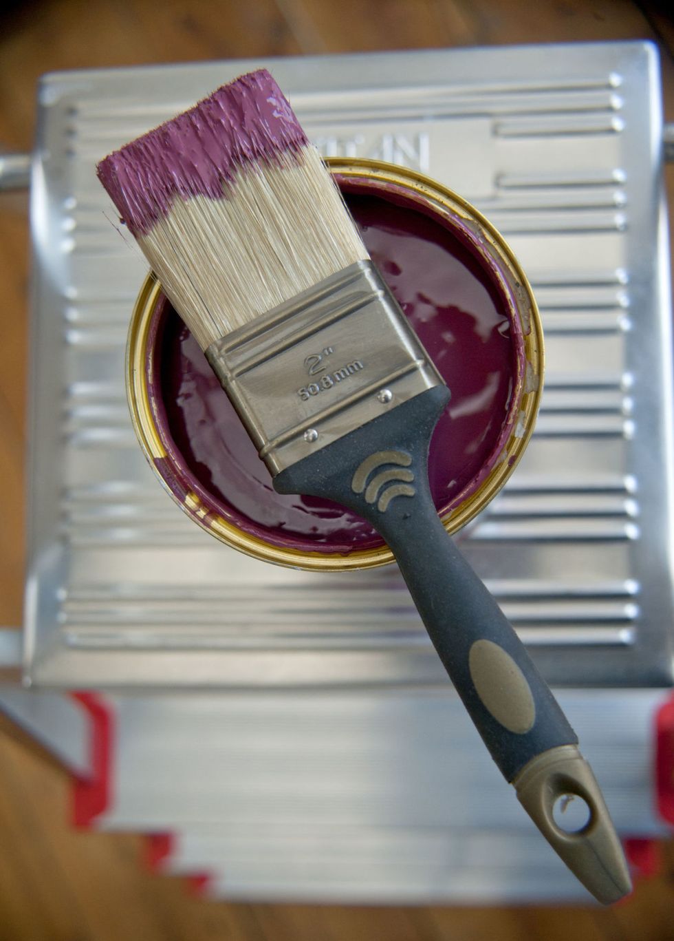 Still life of paint brush dipped in paint