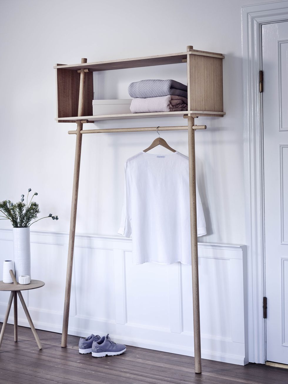 The beautiful Woud Tojbox Clothes Rack Small, designed by Made by Michael, contains all of the functionality and craftsmanship of the original, just in a slightly smaller form.