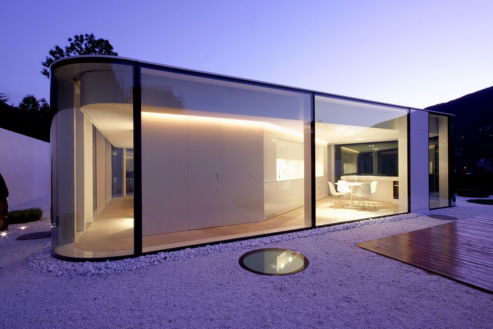 Glass villa in Switzerland designed by the famous Milanese architect, Jacopo Mascheroni
