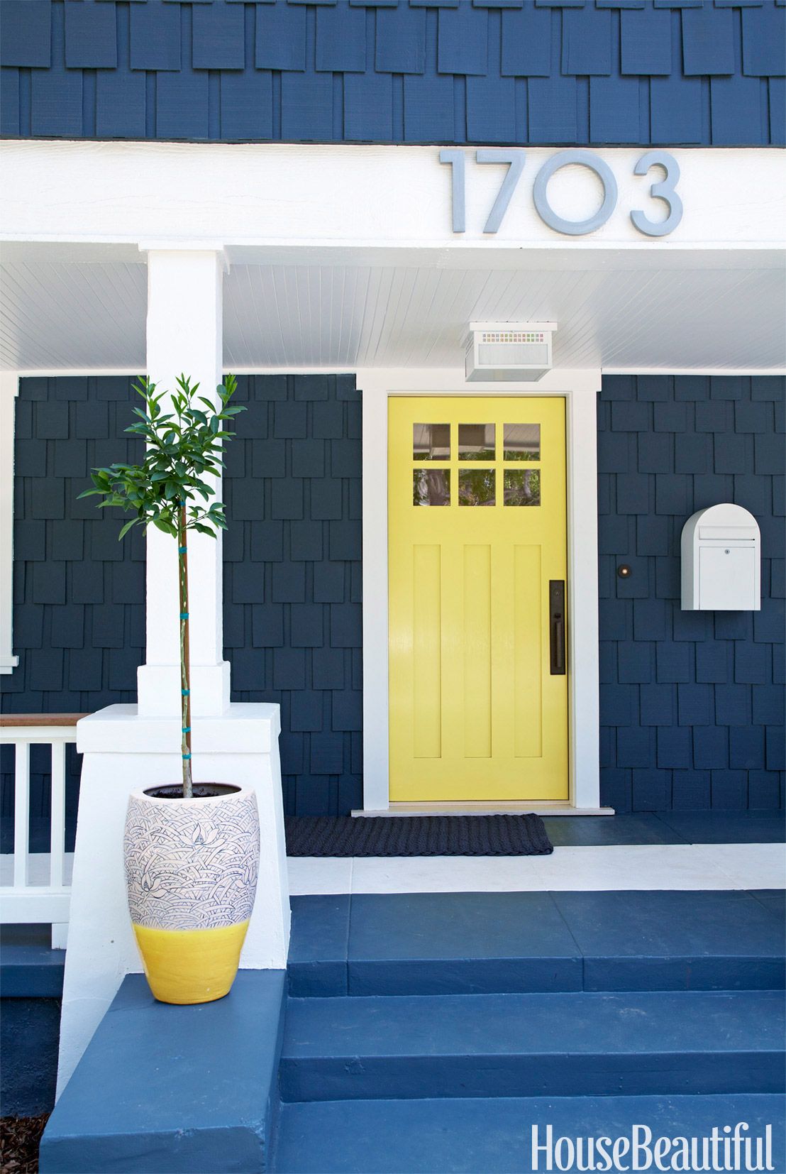 navy house yellow door