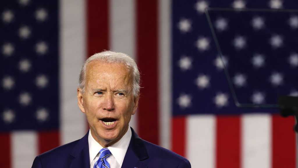 Biden heads west for a policy victory lap, drawing an implicit contrast with  Trump