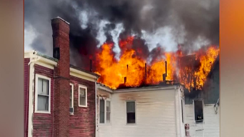 Boston firefighters respond to burning rooftops along E. Broadway