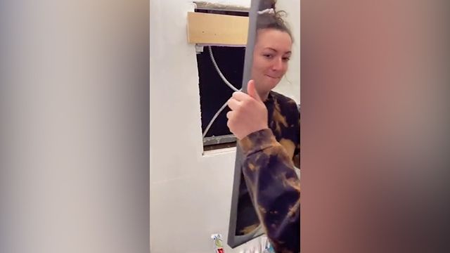 NYC Woman Finds Hole Behind Her Bathroom Mirror Leading to Strange Secret  Apartment – NBC New York