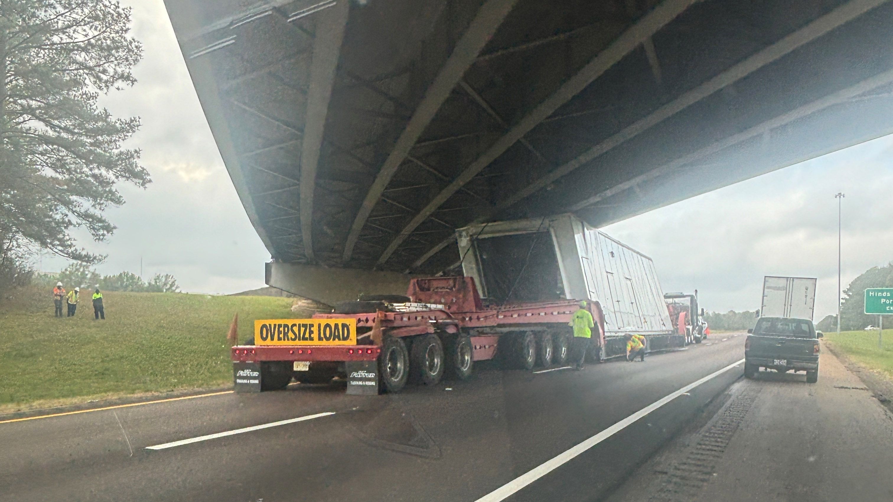 Oversized load' gets stuck under bridge, backing up traffic