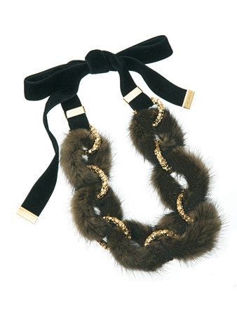 Costume accessory, Fur, Knot, Strap, Natural material, Pet supply, Earrings, Tail, Craft, 
