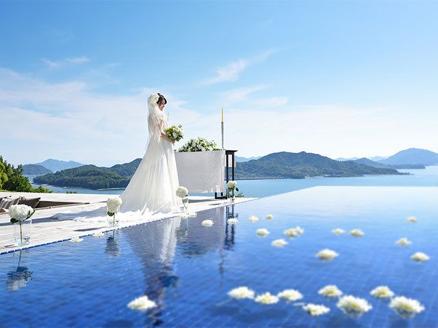 Clothing, Blue, Dress, Water, Bridal clothing, Landscape, Wedding dress, Bride, Gown, Petal, 