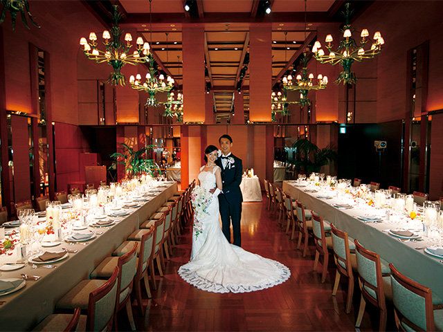 Lighting, Tablecloth, Event, Dress, Bridal clothing, Function hall, Textile, Decoration, Suit, Coat, 
