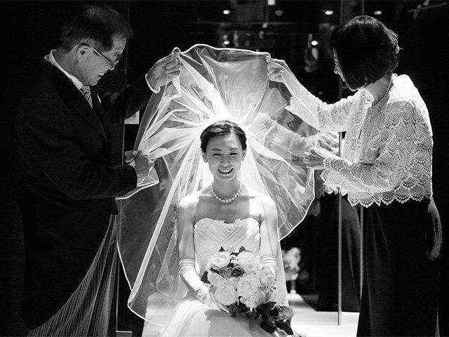 Trousers, Bridal veil, Veil, Coat, Bridal clothing, Photograph, Outerwear, Bridal accessory, Dress, Suit, 
