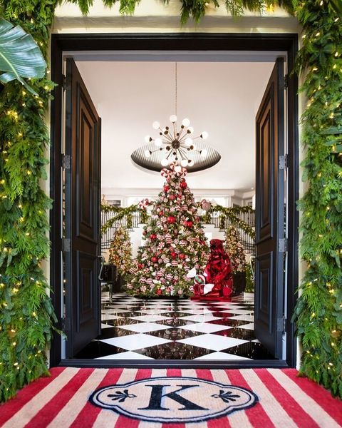 Christmas decoration, Red, Tree, Home, Christmas, Room, Interior design, Architecture, Door, Floor, 