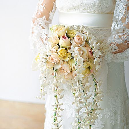 Yellow, Bridal accessory, Petal, Textile, Bridal clothing, White, Wedding dress, Dress, Cut flowers, Gown, 