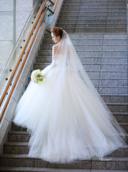 Wedding dress, Bride, Gown, Dress, Clothing, Bridal clothing, Bridal accessory, Photograph, Bridal party dress, Shoulder, 
