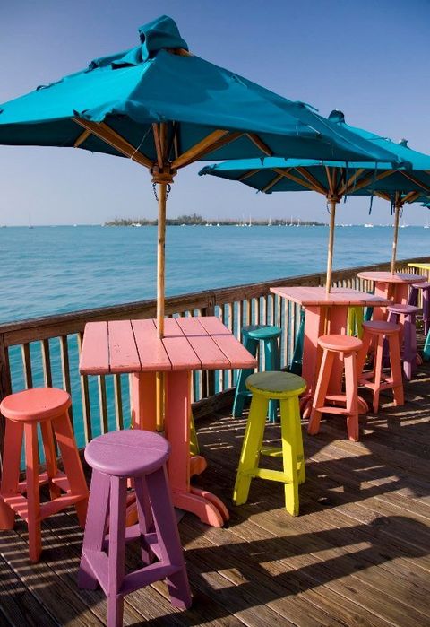 Umbrella, Turquoise, Table, Furniture, Beach, Sea, Vacation, Sky, Outdoor furniture, Picnic table, 