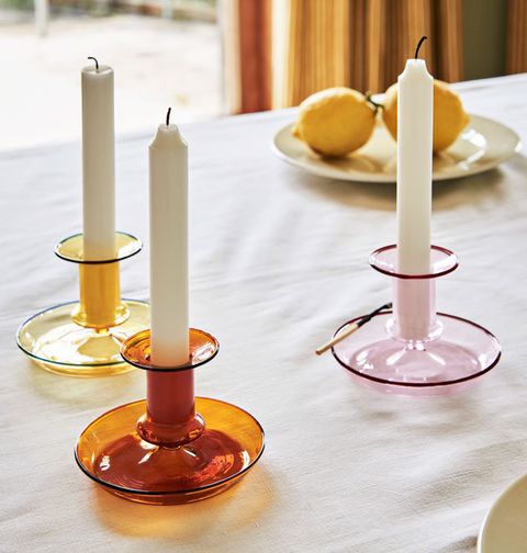 Candle, Candle holder, Lighting, Yellow, Unity candle, Table, Room, Interior design, Oil lamp, Furniture, 