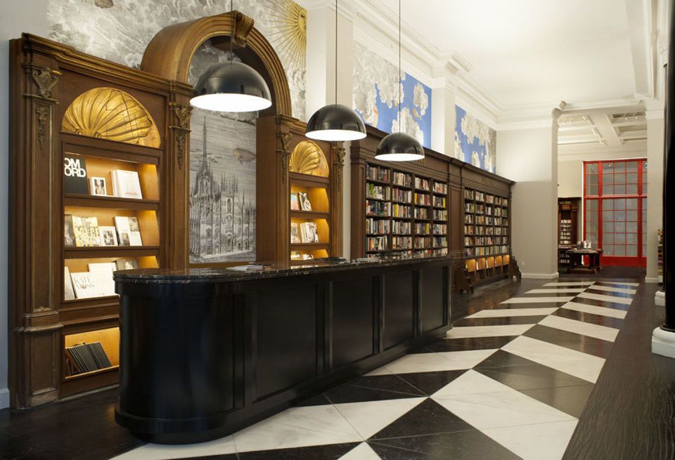 Building, Interior design, Architecture, Library, Furniture, Room, Public library, Lobby, Floor, Shelving, 