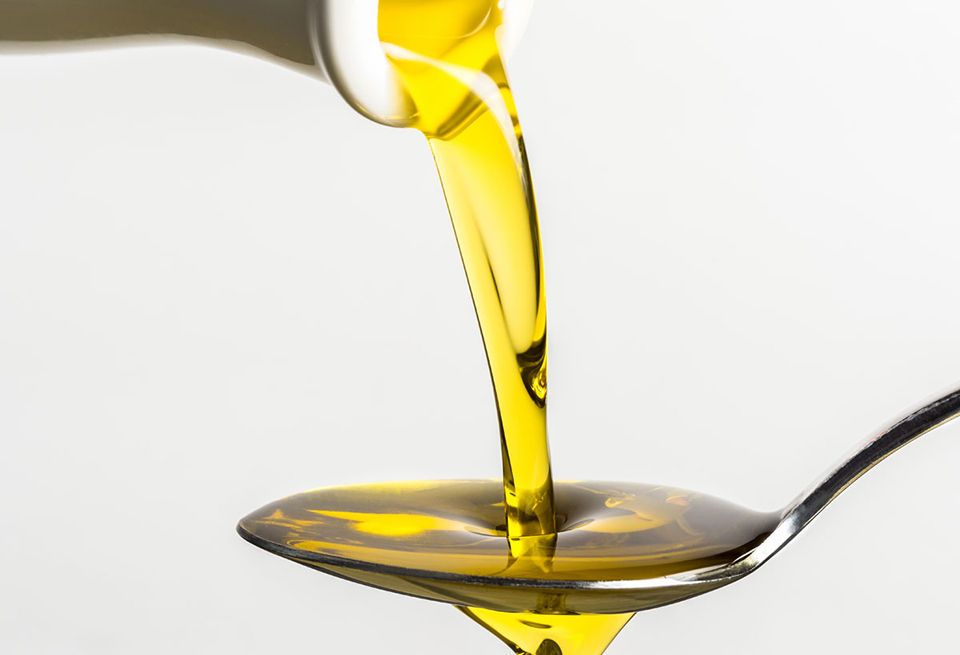 Yellow, Cooking oil, Liquid, Vegetable oil, Olive oil, Honey, Glass, Oil, Champagne stemware, Fluid, 