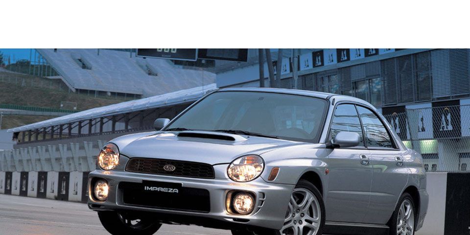 Land vehicle, Vehicle, Car, Sedan, Subaru, Automotive fog light, Rim, Automotive lighting, Coupé, City car, 