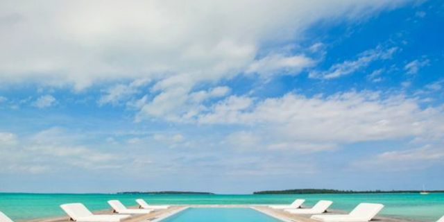 Swimming pool, Sky, Natural landscape, Property, Azure, Turquoise, Sea, Aqua, Ocean, Vacation, 