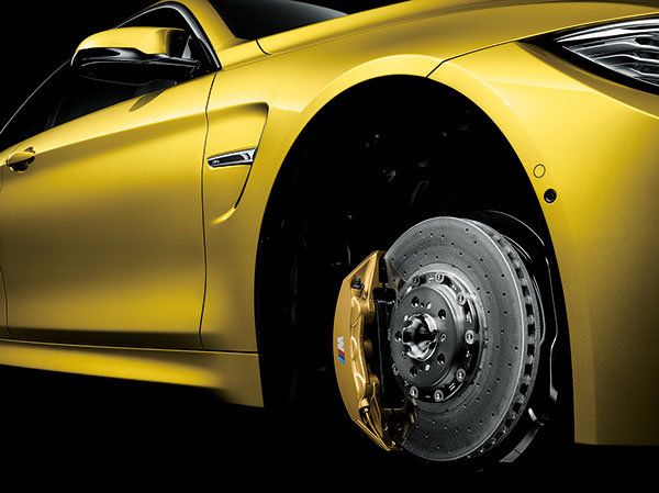 Tire, Automotive design, Automotive tire, Yellow, Vehicle, Alloy wheel, Automotive wheel system, Rim, Car, Automotive lighting, 