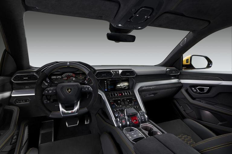 Land vehicle, Vehicle, Car, Center console, Automotive design, Steering wheel, Luxury vehicle, Performance car, Personal luxury car, Gear shift, 