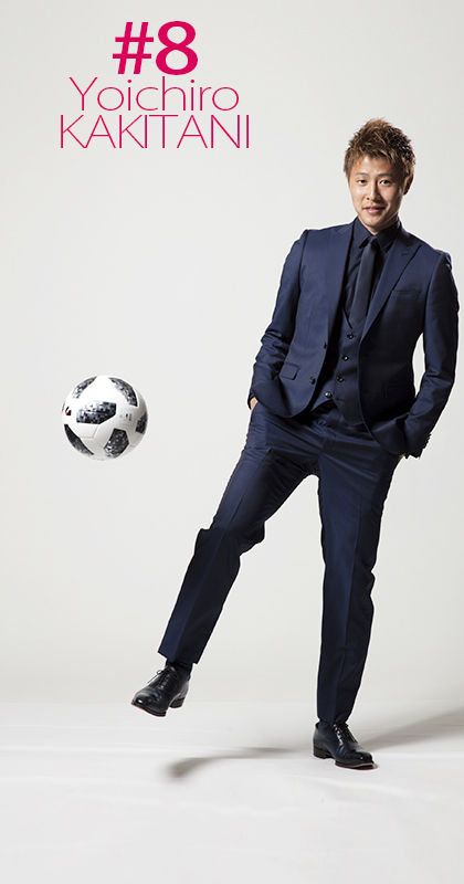 Suit, Formal wear, Standing, Soccer ball, Ball, Photography, Album cover, Tuxedo, Style, White-collar worker, 