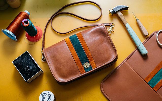 Brown, Product, Textile, Bag, Musical instrument accessory, Everyday carry, Tan, Mobile device, Leather, Material property, 