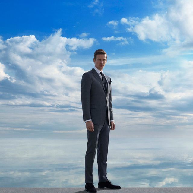 Blue, Sky, Dress shirt, Collar, Trousers, Cloud, Suit trousers, Coat, Shirt, Standing, 