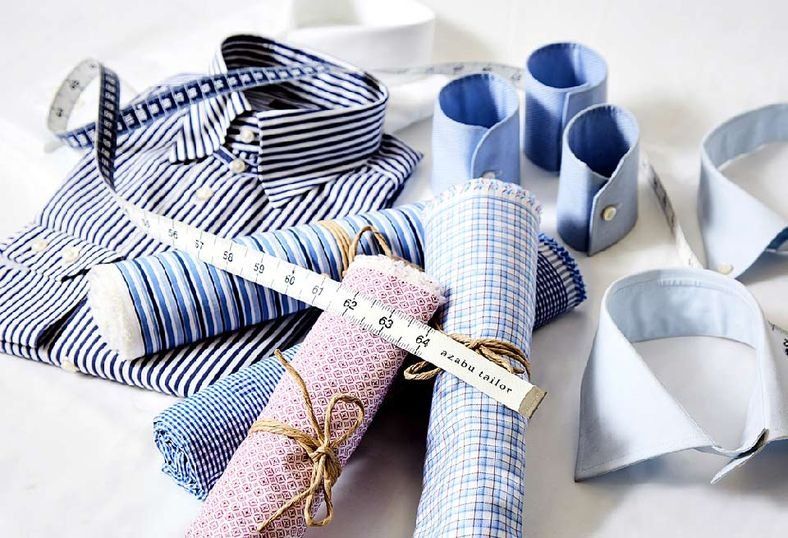 Blue, Ribbon, Tableware, Gift wrapping, Cutlery, Textile, Spoon, Dress shirt, Wedding favors, Pattern, 