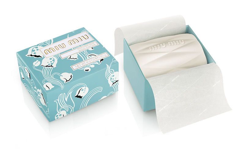 Aqua, Facial tissue, Turquoise, Wedding favors, Party favor, Paper, Paper product, Box, Household supply, Packaging and labeling, 