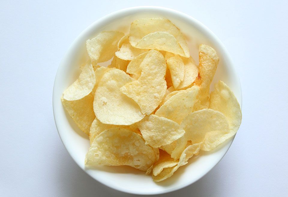 Junk food, Food, Dish, Potato chip, Cuisine, Snack, Yellow, Ingredient, Side dish, Produce, 