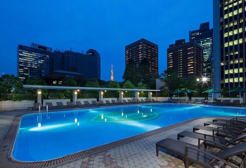 Swimming pool, Property, Real estate, Condominium, Building, Commercial building, Metropolitan area, Tower block, Azure, Mixed-use, 