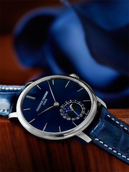 Blue, Analog watch, Product, Watch, Glass, Electric blue, Watch accessory, Wrist, Font, Fashion accessory, 