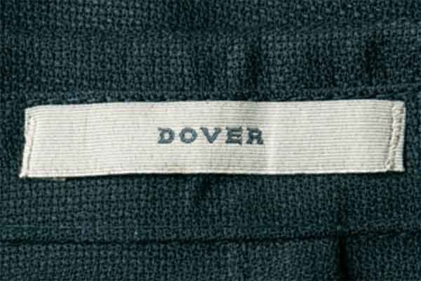 Textile, Text, Pattern, Material property, Label, Webbing, Trademark, Stitch, Number, 