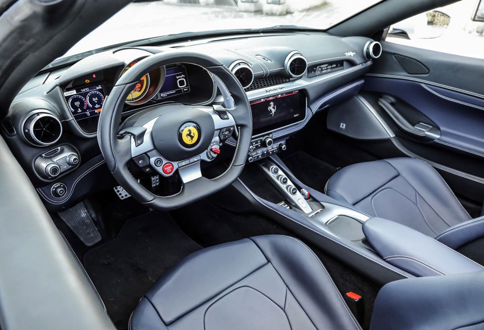 Land vehicle, Vehicle, Car, Center console, Steering wheel, Luxury vehicle, Supercar, Gear shift, Personal luxury car, Sports car, 