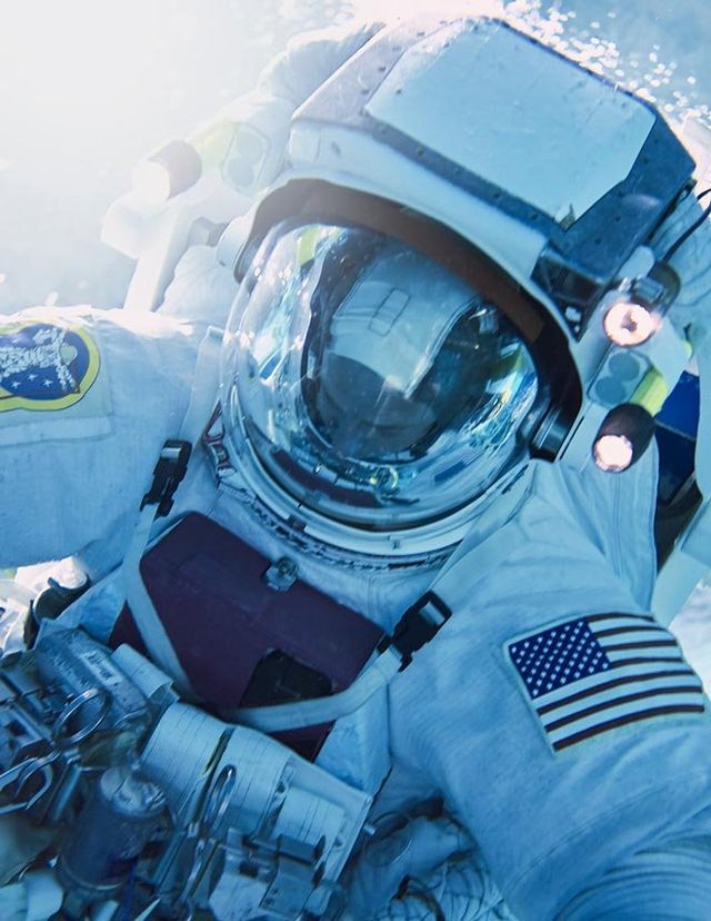Astronaut, Personal protective equipment, Helmet, Space, Photography, Costume, Aerospace engineering, Illustration, 