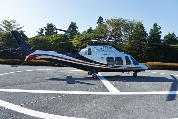Helicopter, Rotorcraft, Mode of transport, Aircraft, Helicopter rotor, Road surface, Glass, Asphalt, Aviation, Windshield, 